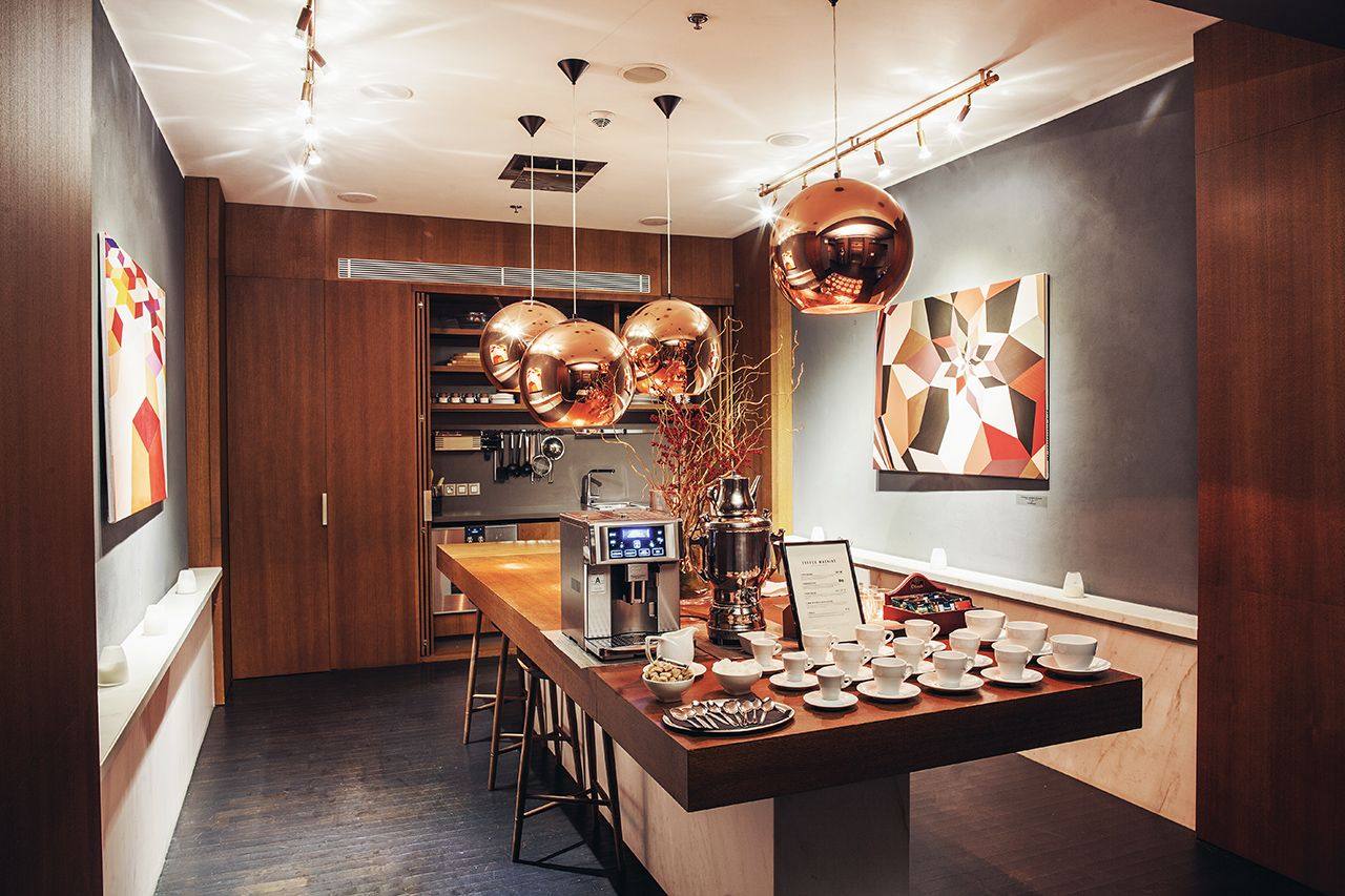 The coffee bar with copper pendant lights